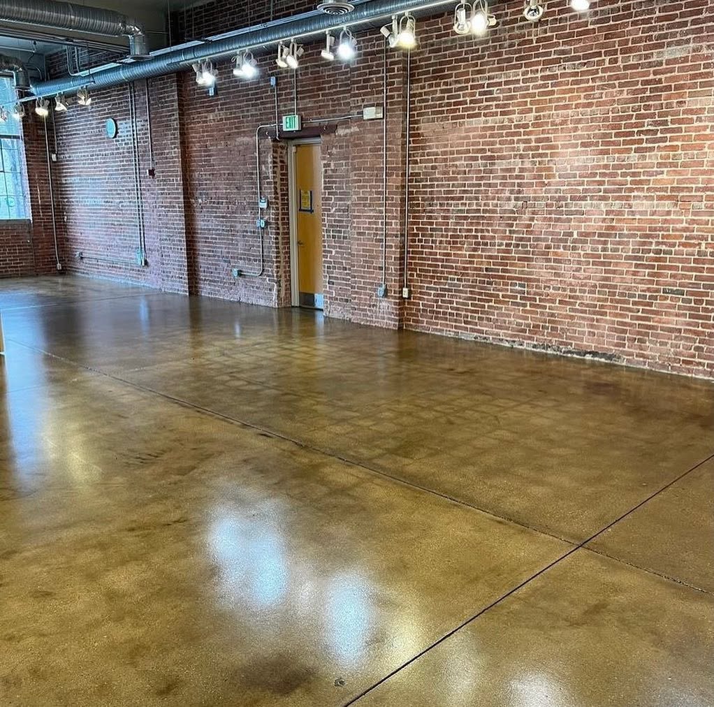 A renovated brick loft with a new sealed concrete floor