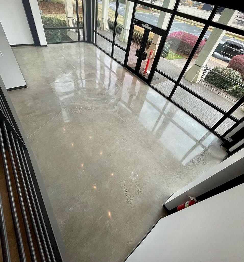 New polished concrete and black steel windows