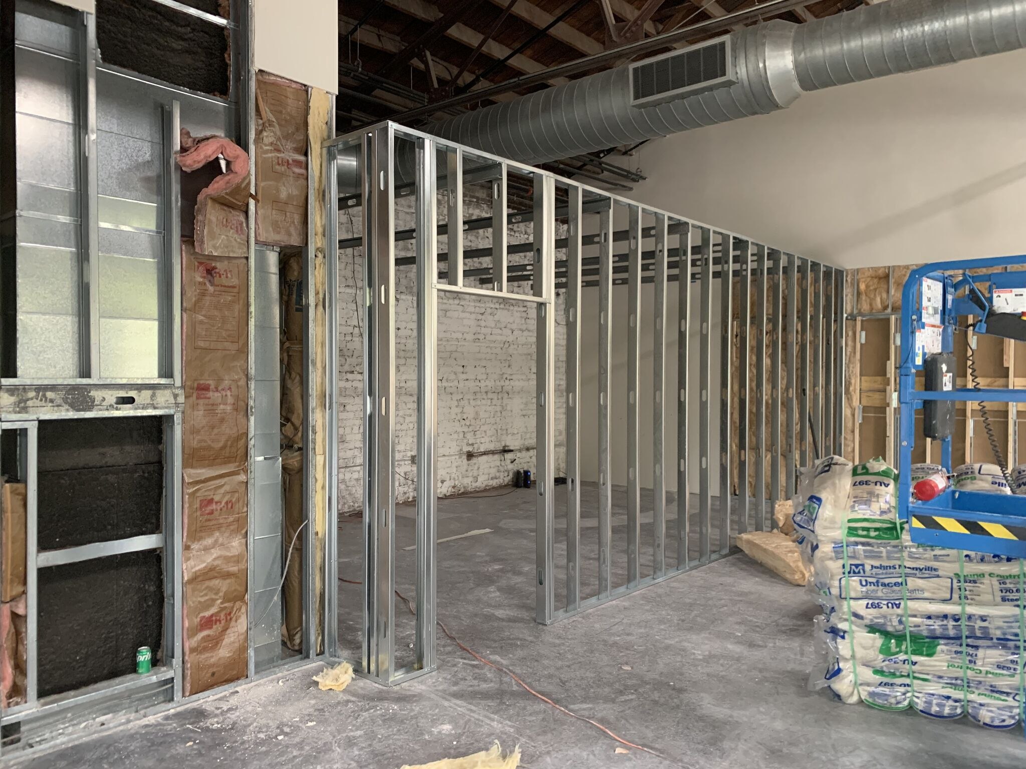 Metal stud framing inside the Schumacher showroom at Pepper Place